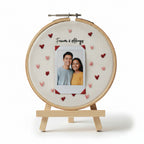Embroidery hoop with a photo of a couple and 'Forever & Always' text on a white background