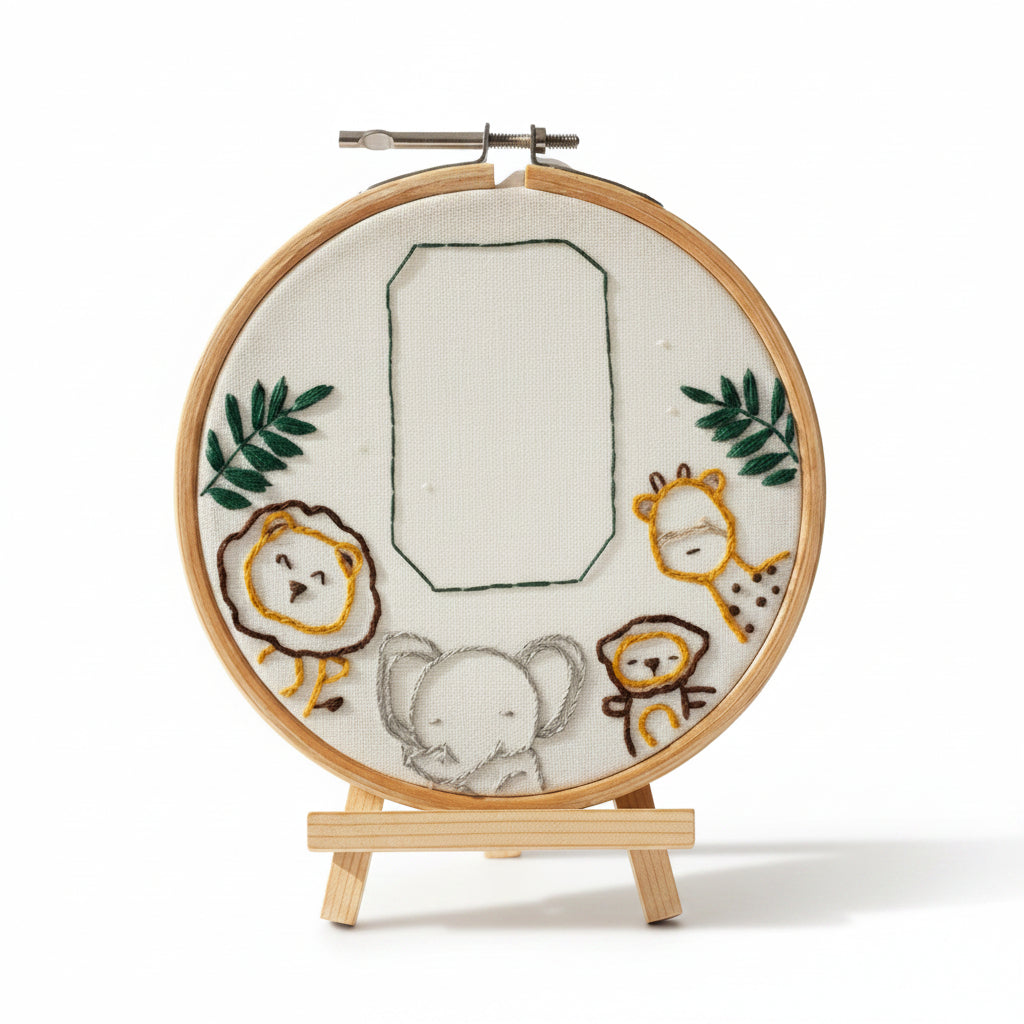 Embroidery hoop with embroidered animals on a white background